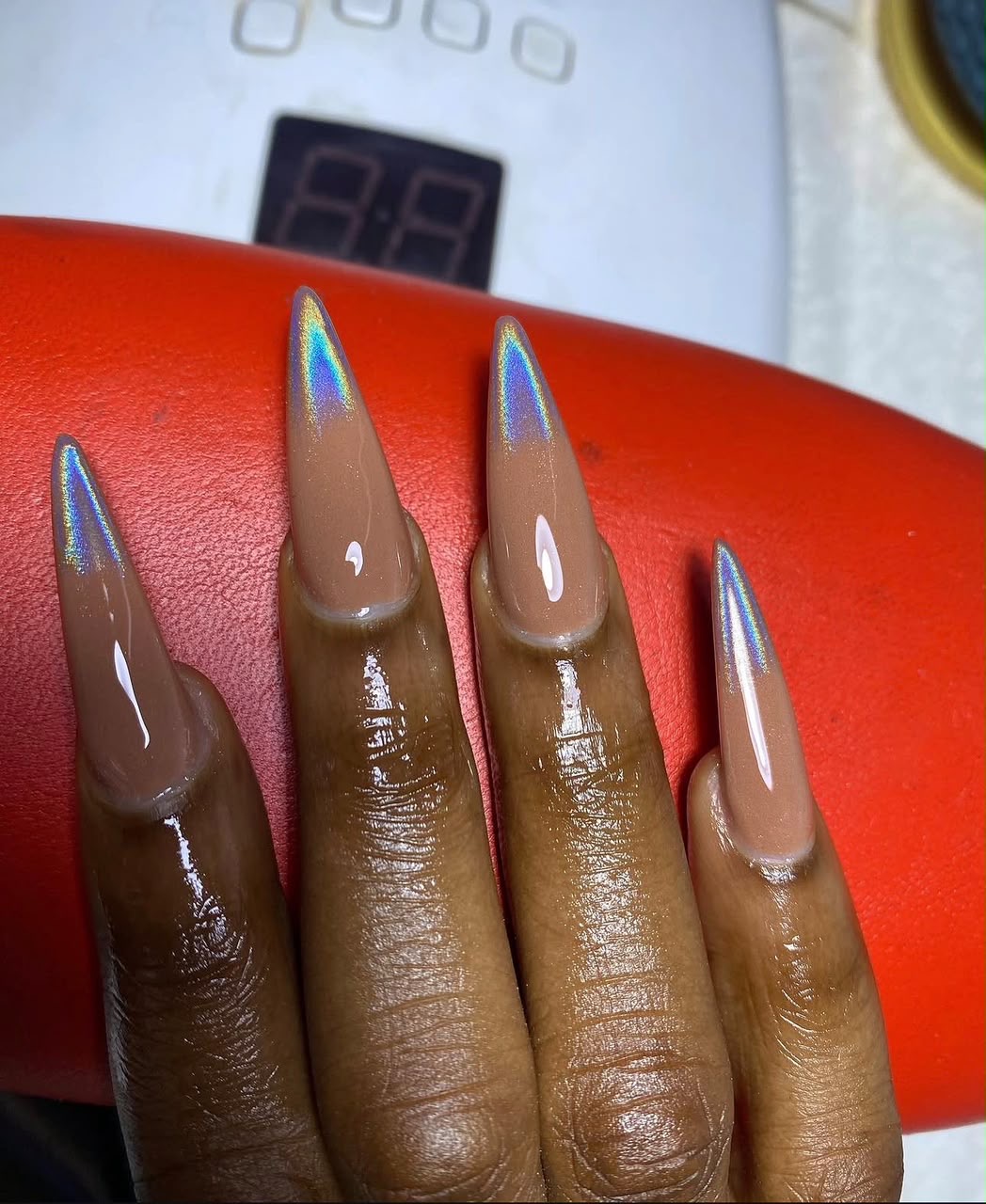 Matte taupe nail art with fine gold detail created at Wunmy Nails, Egbeda Lagos